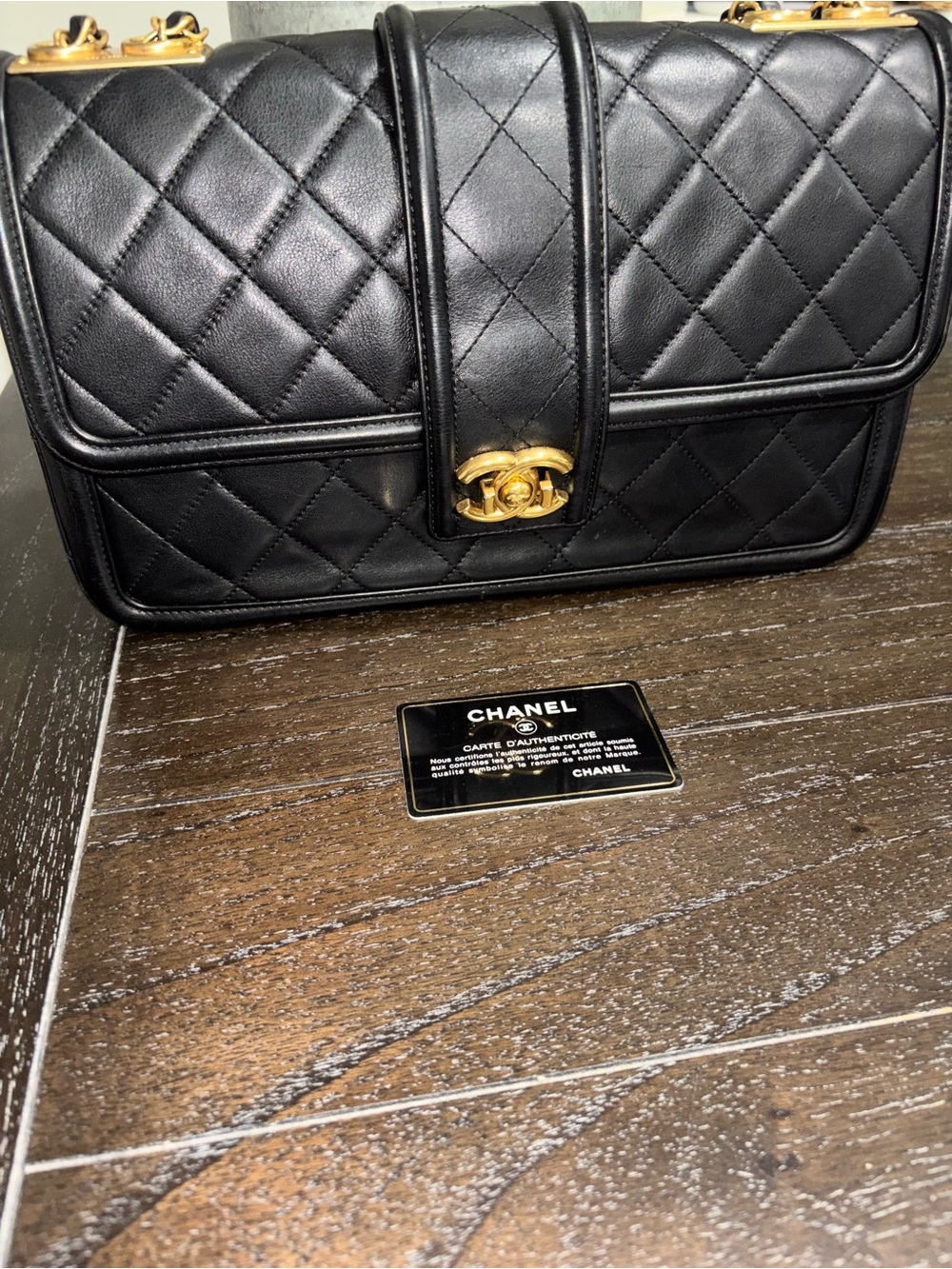 CHANEL Black Quilted Leather Shoulder Bag with Gold CC Turn-Lock